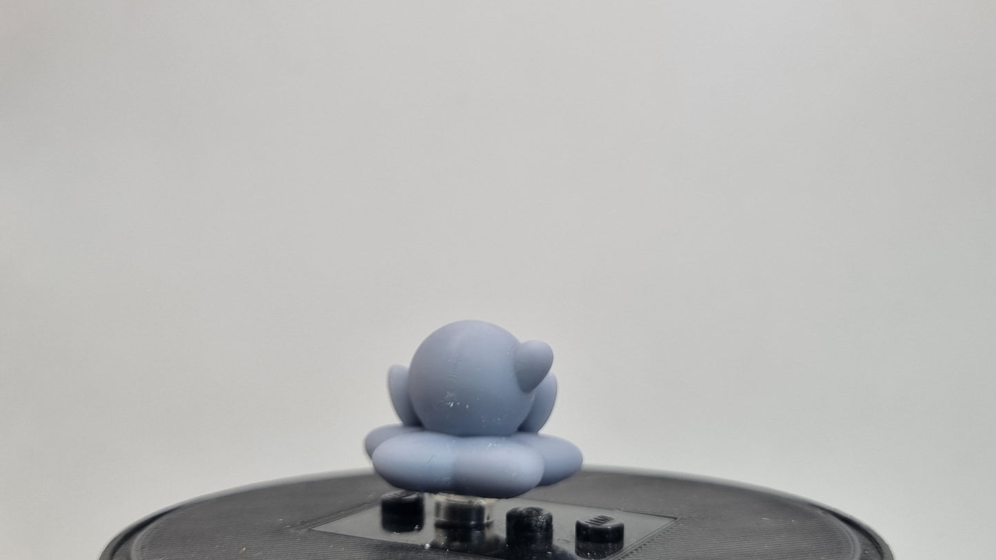 Building toy custom 3D printed purple blob on star!