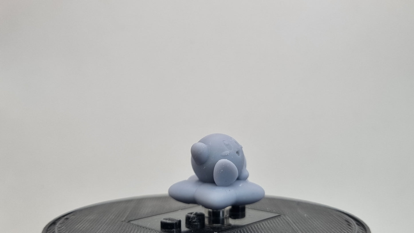 Building toy custom 3D printed purple blob on star!
