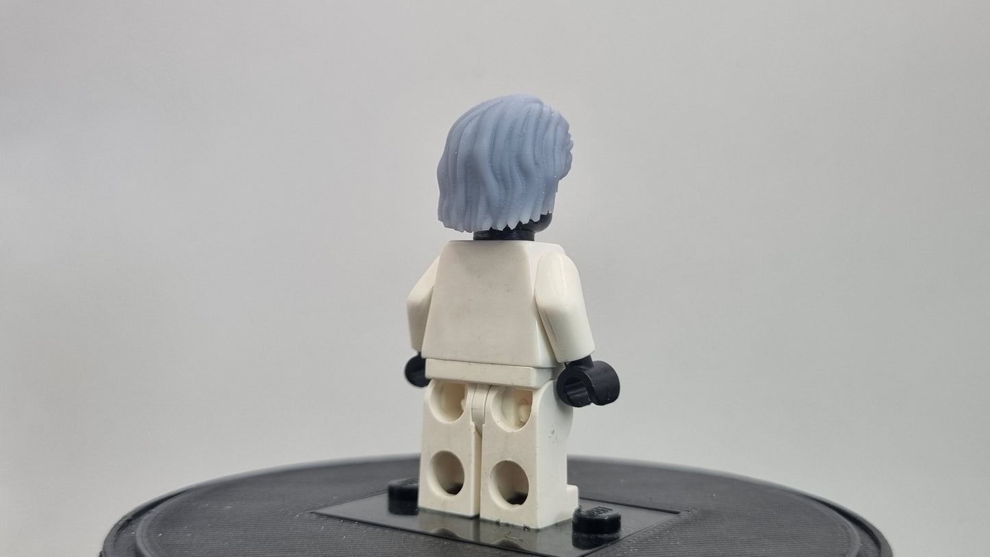 Building toy custom 3D printed laughing villain hair!