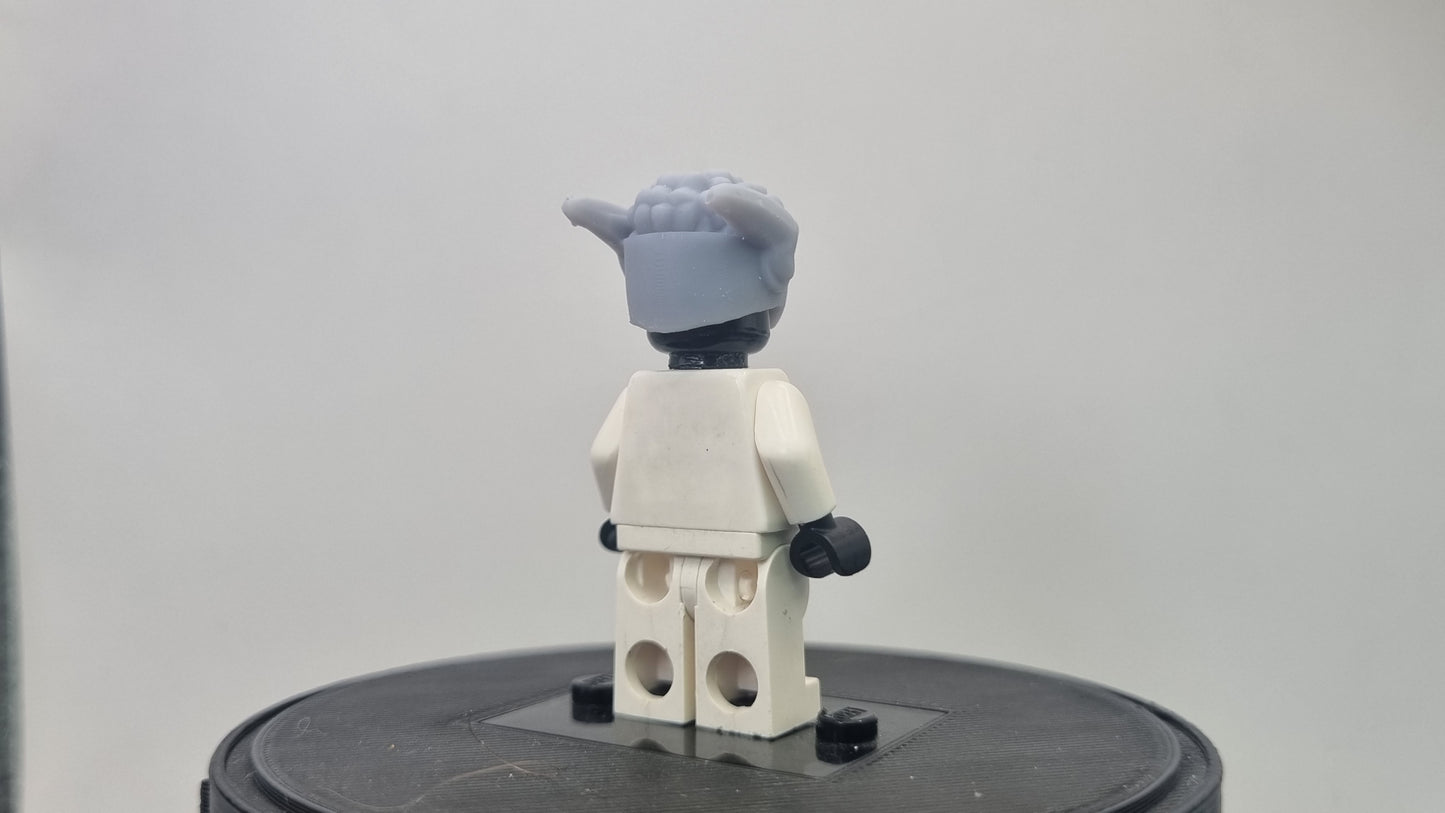 Building toy custom 3D printed super hero fast runner with small afro!