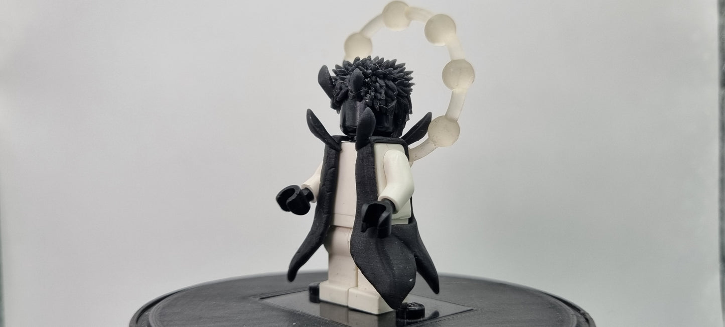 Building toy custom 3D printed ninja with rings behind him!