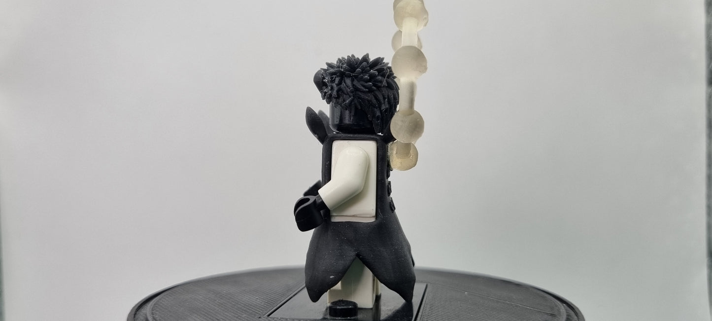 Building toy custom 3D printed ninja with rings behind him!