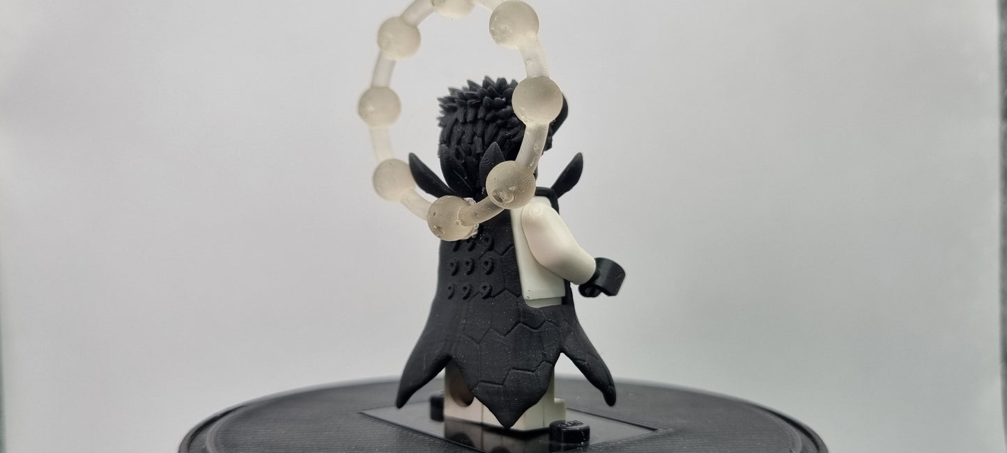 Building toy custom 3D printed ninja with rings behind him!
