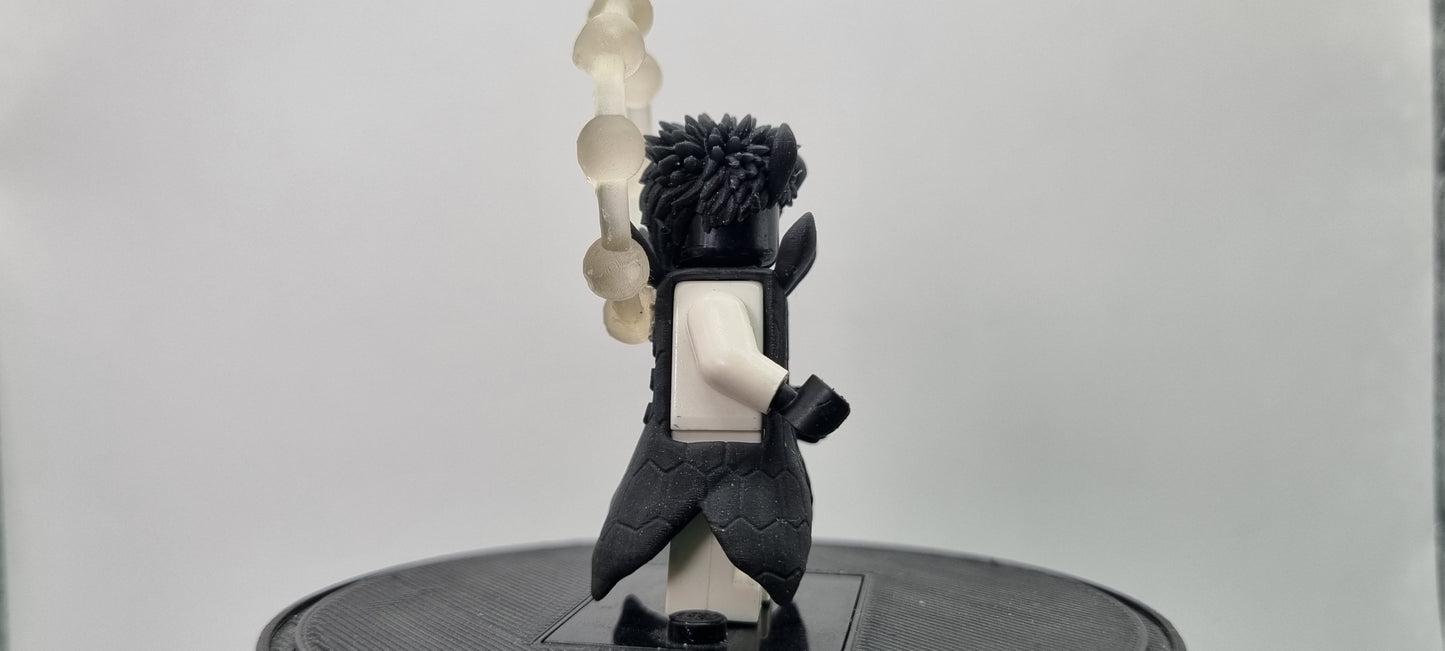 Building toy custom 3D printed ninja with rings behind him!