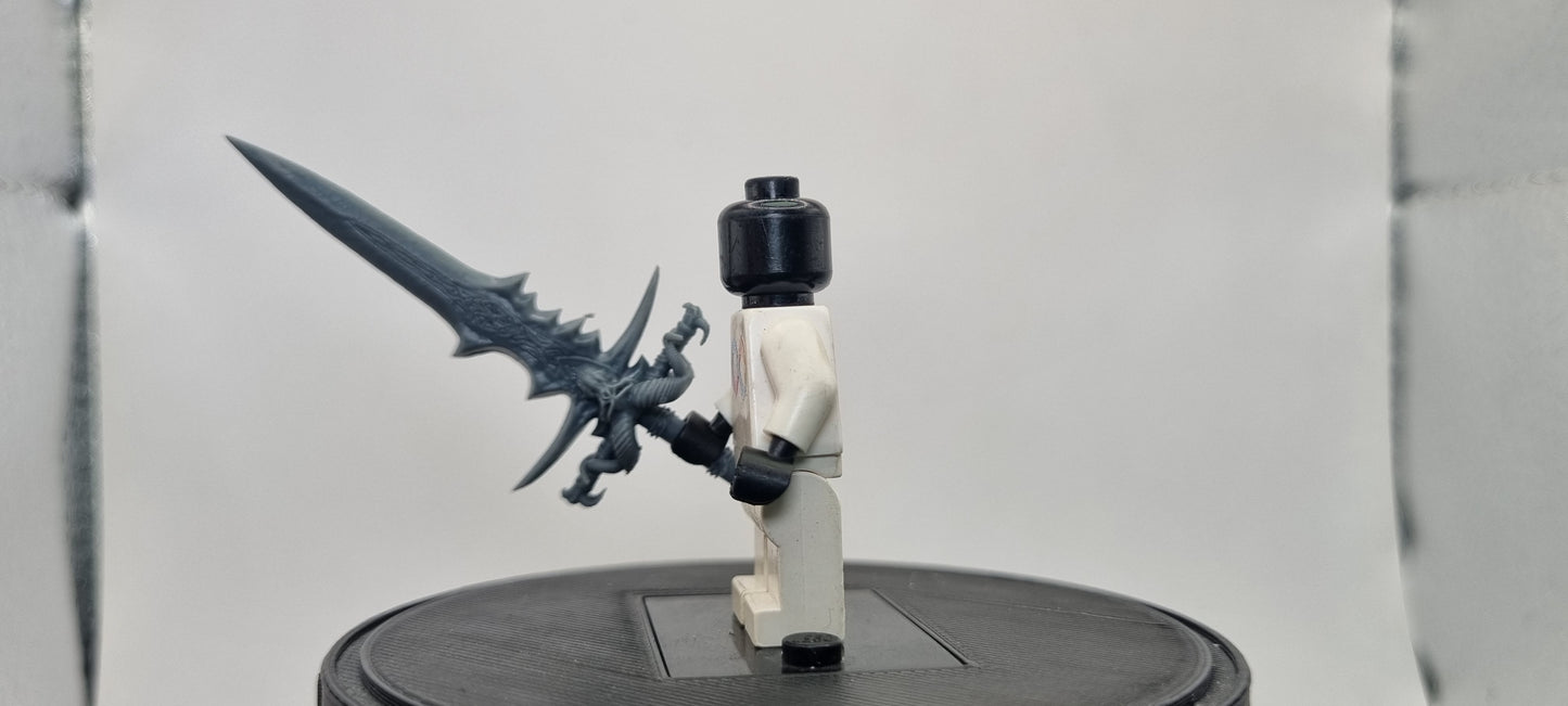 Building toy custom 3D printed wow mega frost sword. Printed in 12k high resolution resin!