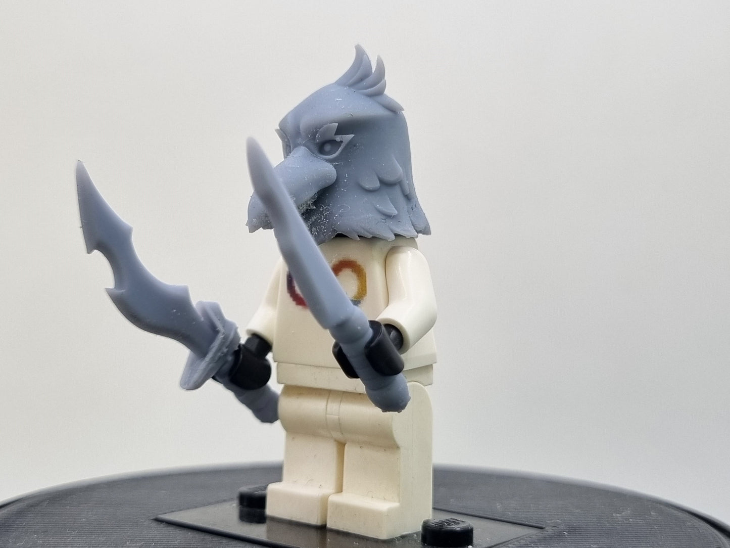 Building toy custom 3D printed bird mask with knifes
