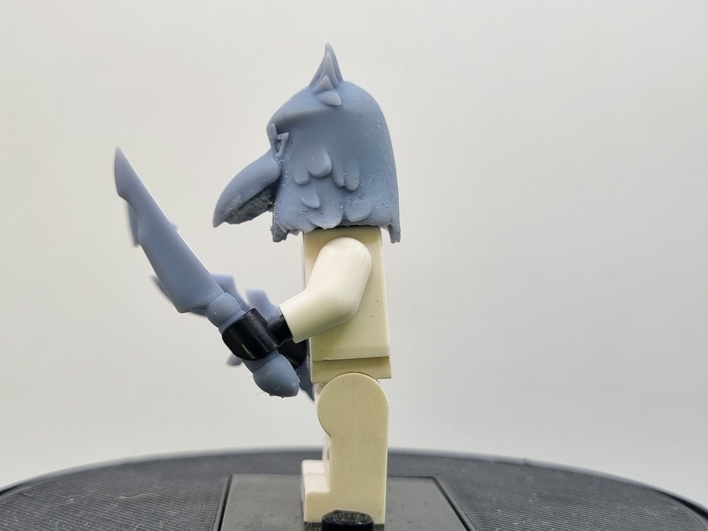 Building toy custom 3D printed bird mask with knifes