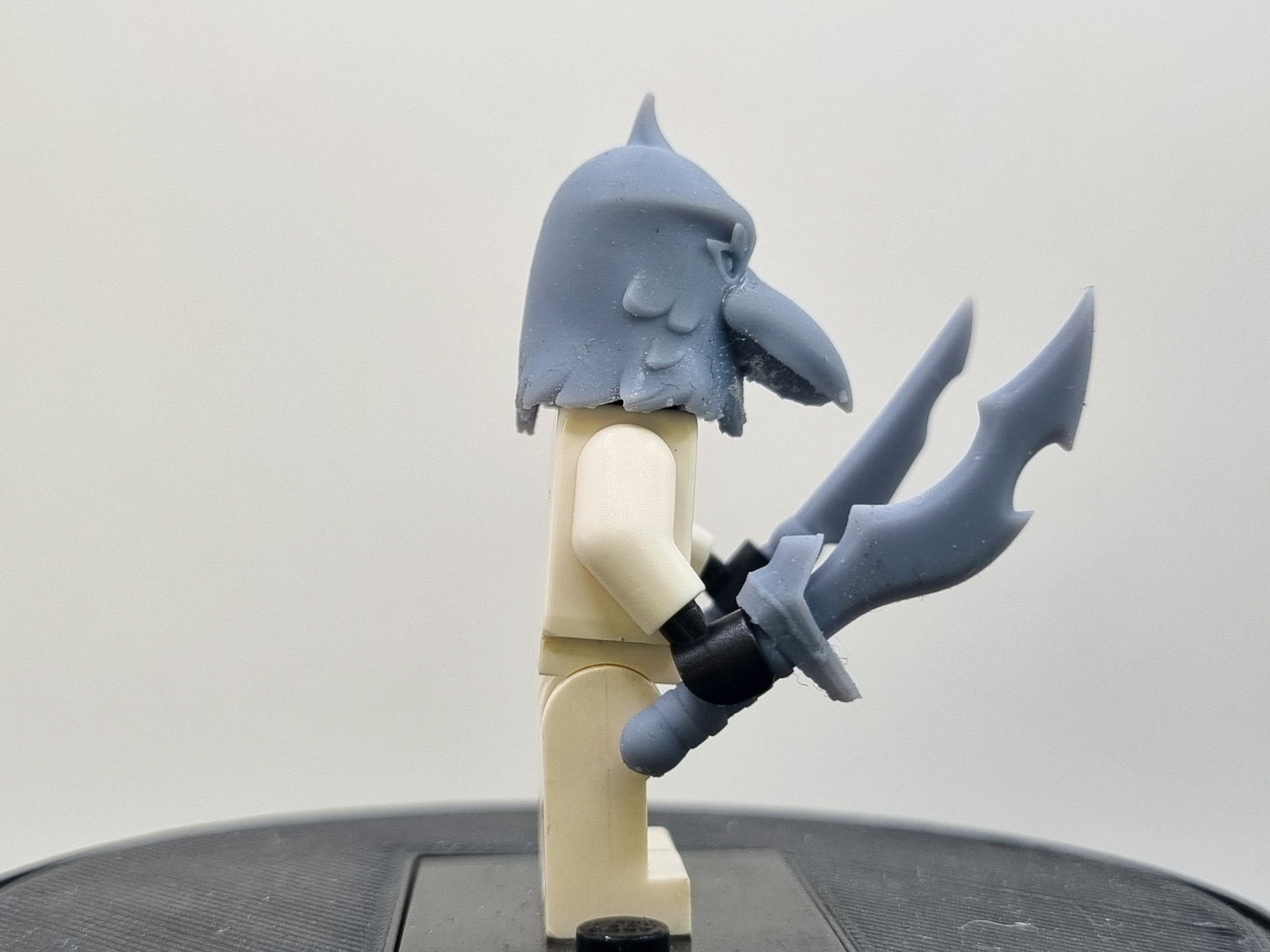 Building toy custom 3D printed bird mask with knifes