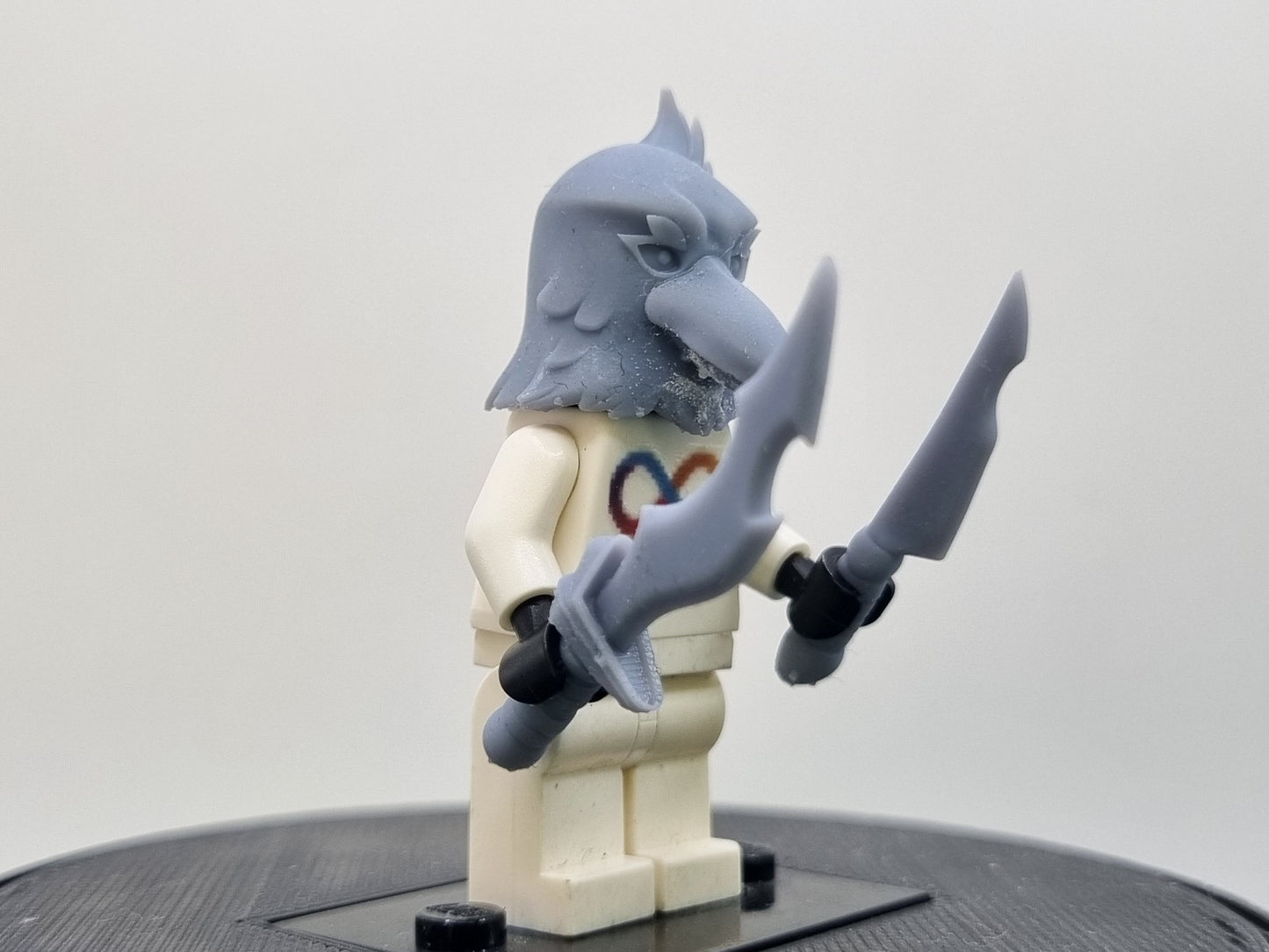 Building toy custom 3D printed bird mask with knifes