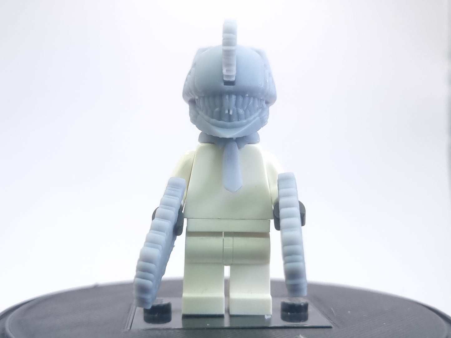Custom lego compatible dude with chainsaws everwhere!