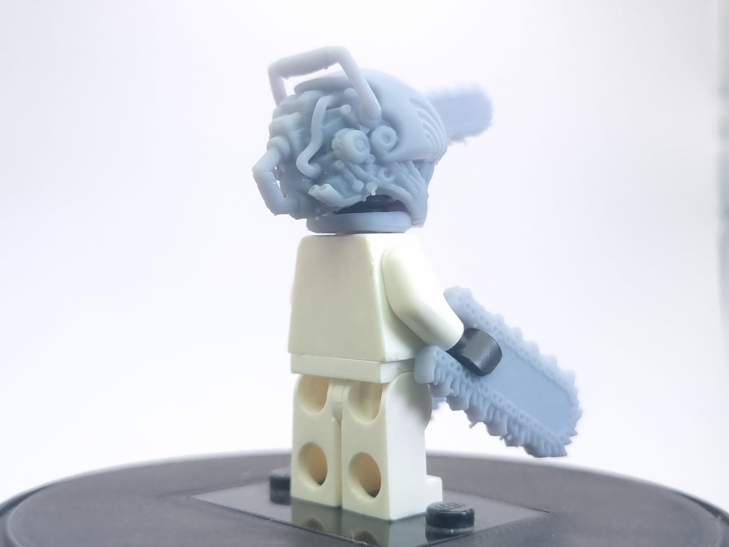 Custom lego compatible dude with chainsaws everwhere!