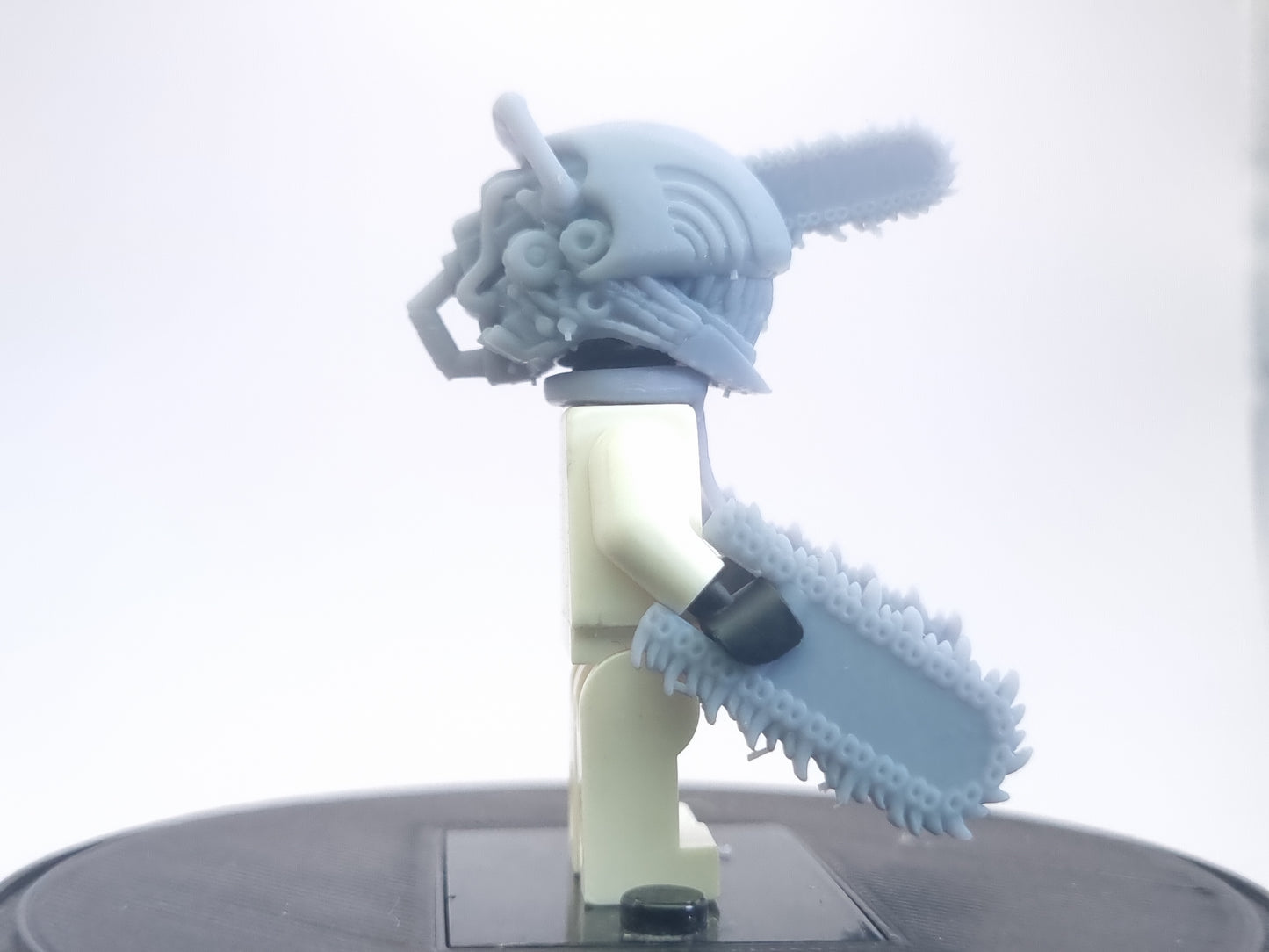 Custom lego compatible dude with chainsaws everwhere!