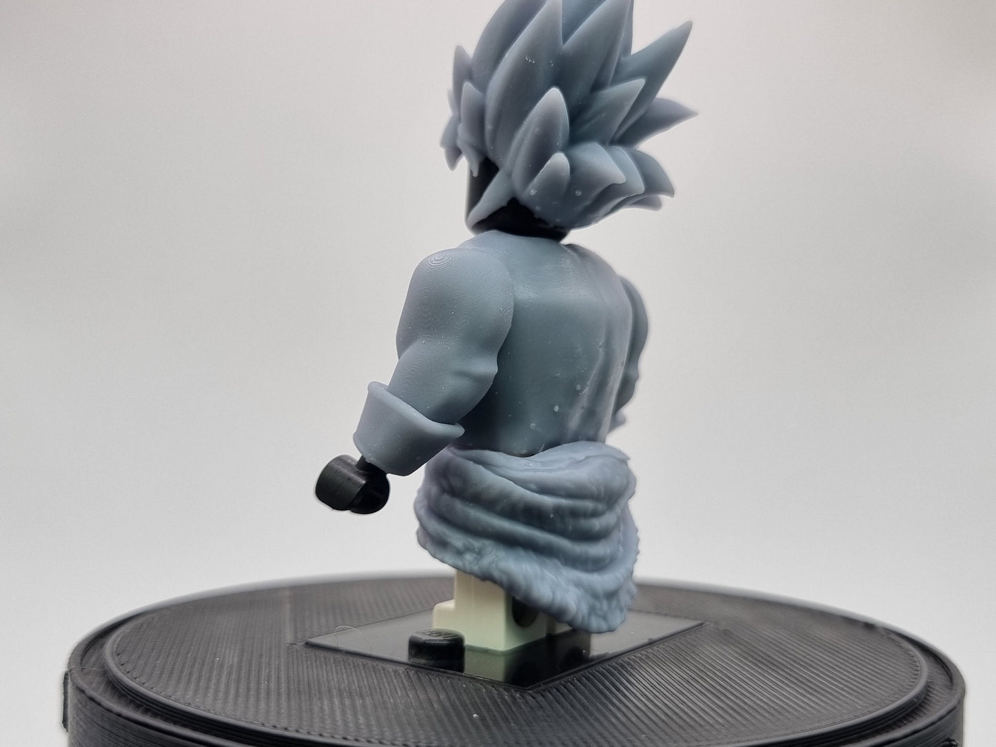 Building toy buffed guy with spikey hair!
