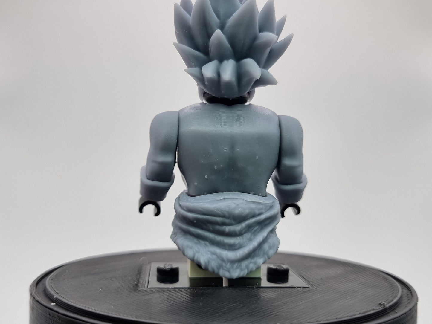Building toy buffed guy with spikey hair!