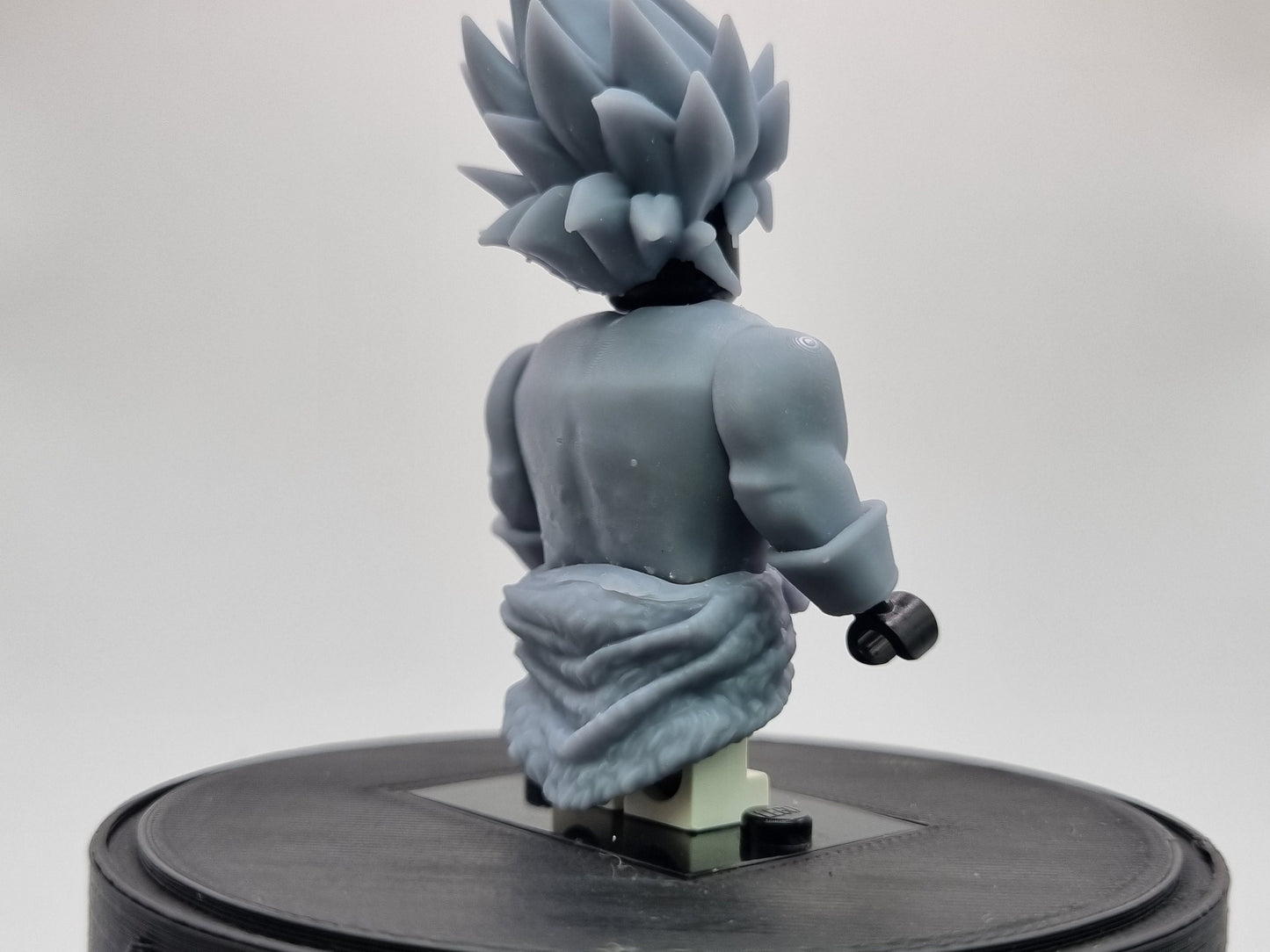 Building toy buffed guy with spikey hair!