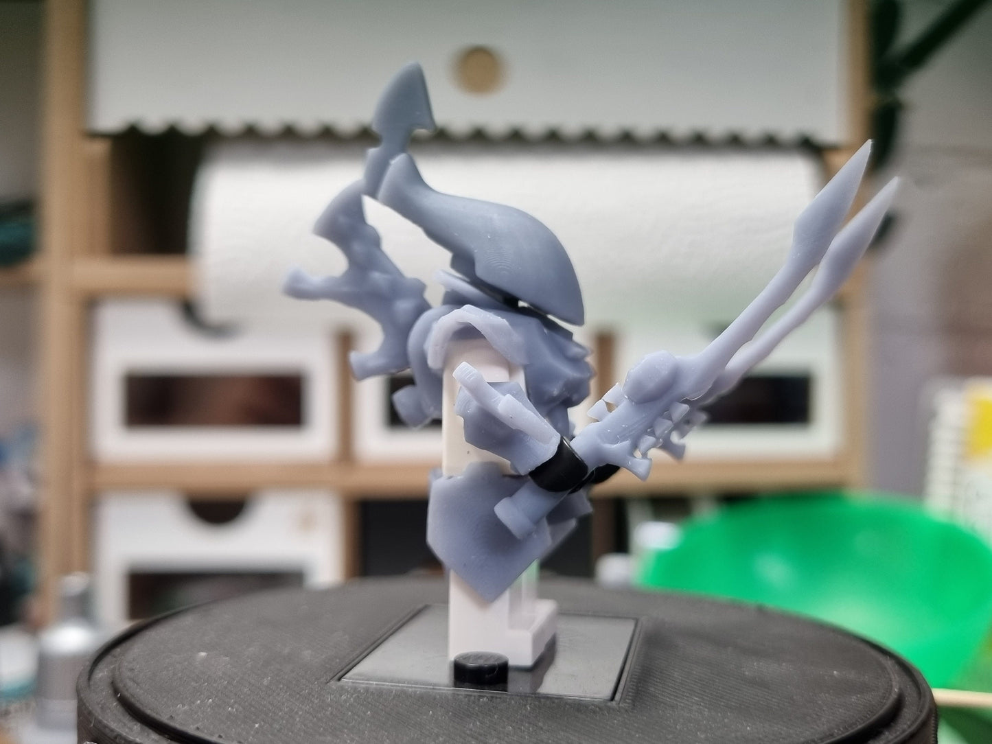Building toy alien with 2 swords!