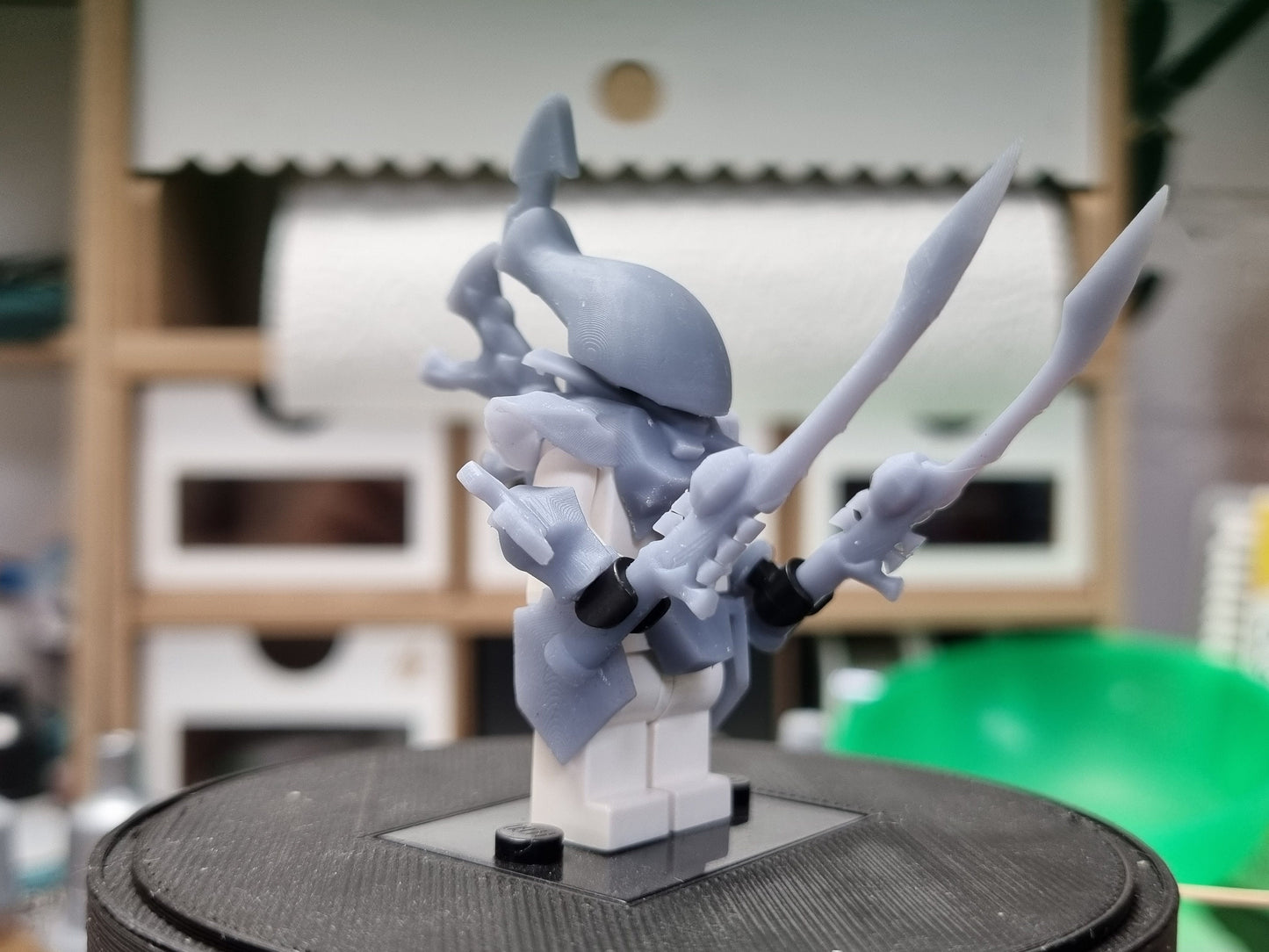 Building toy alien with 2 swords!