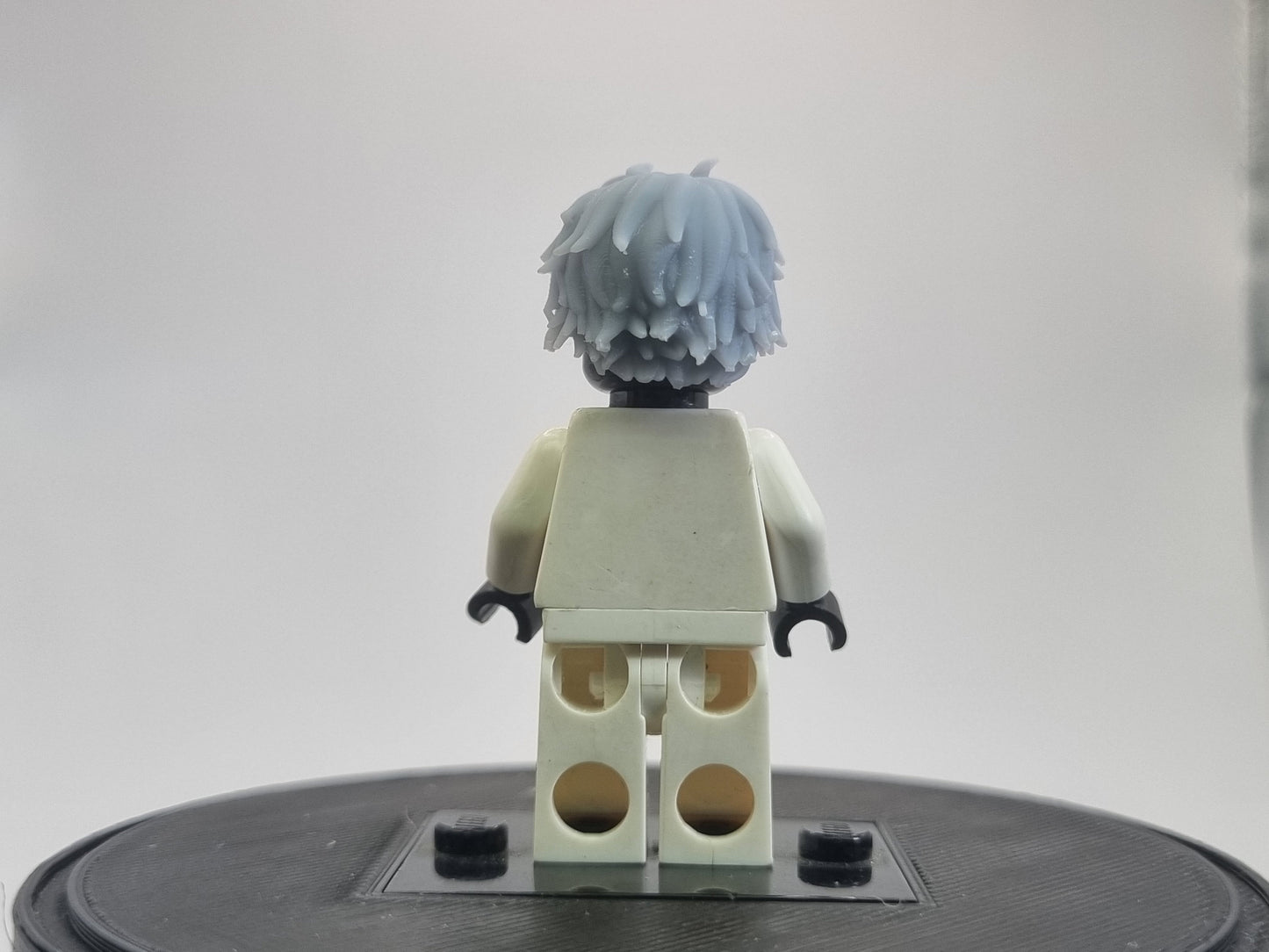 Building toy guy with with garden cutting tools everwhere!