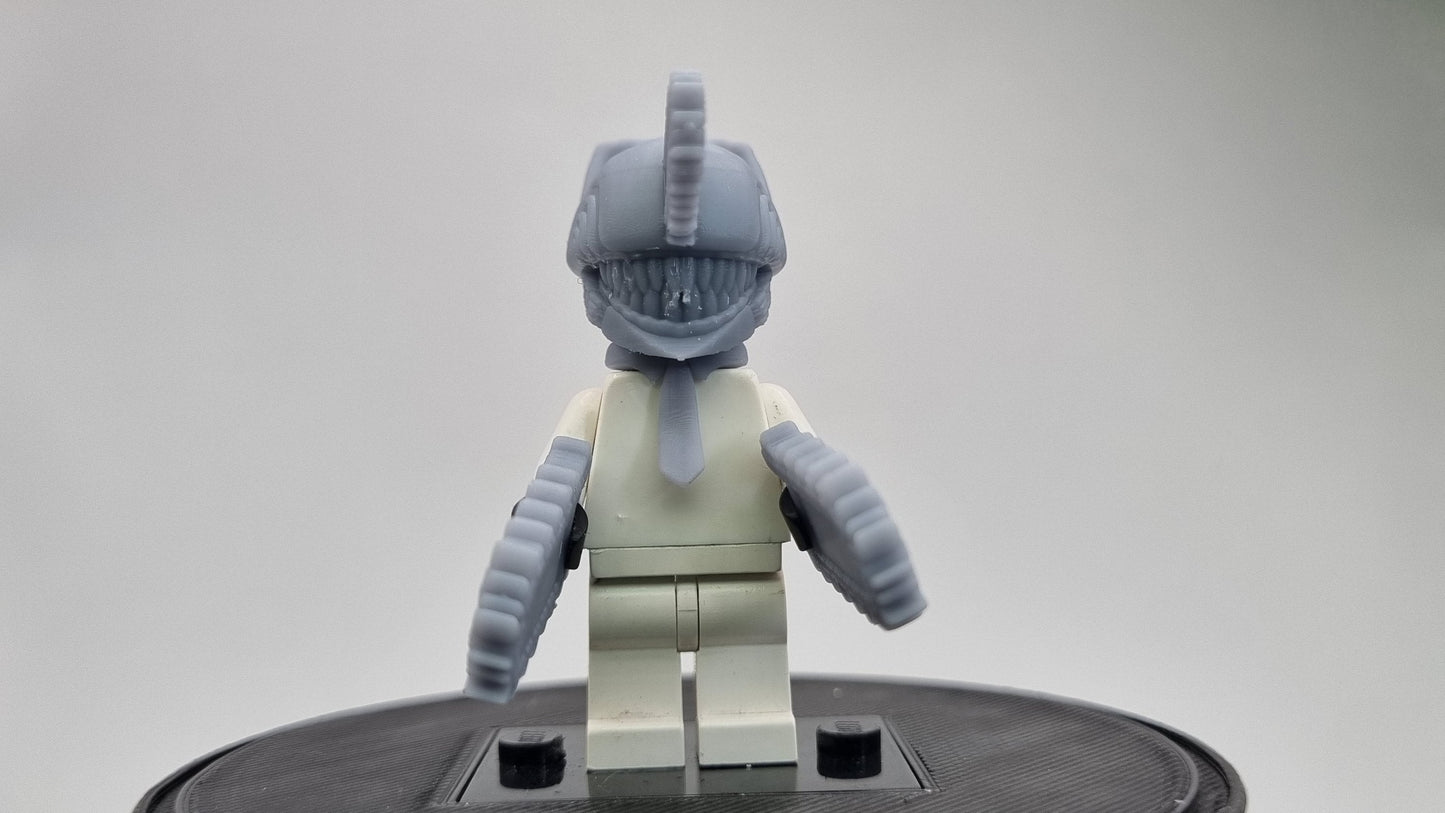 Building toy guy with with garden cutting tools everwhere!