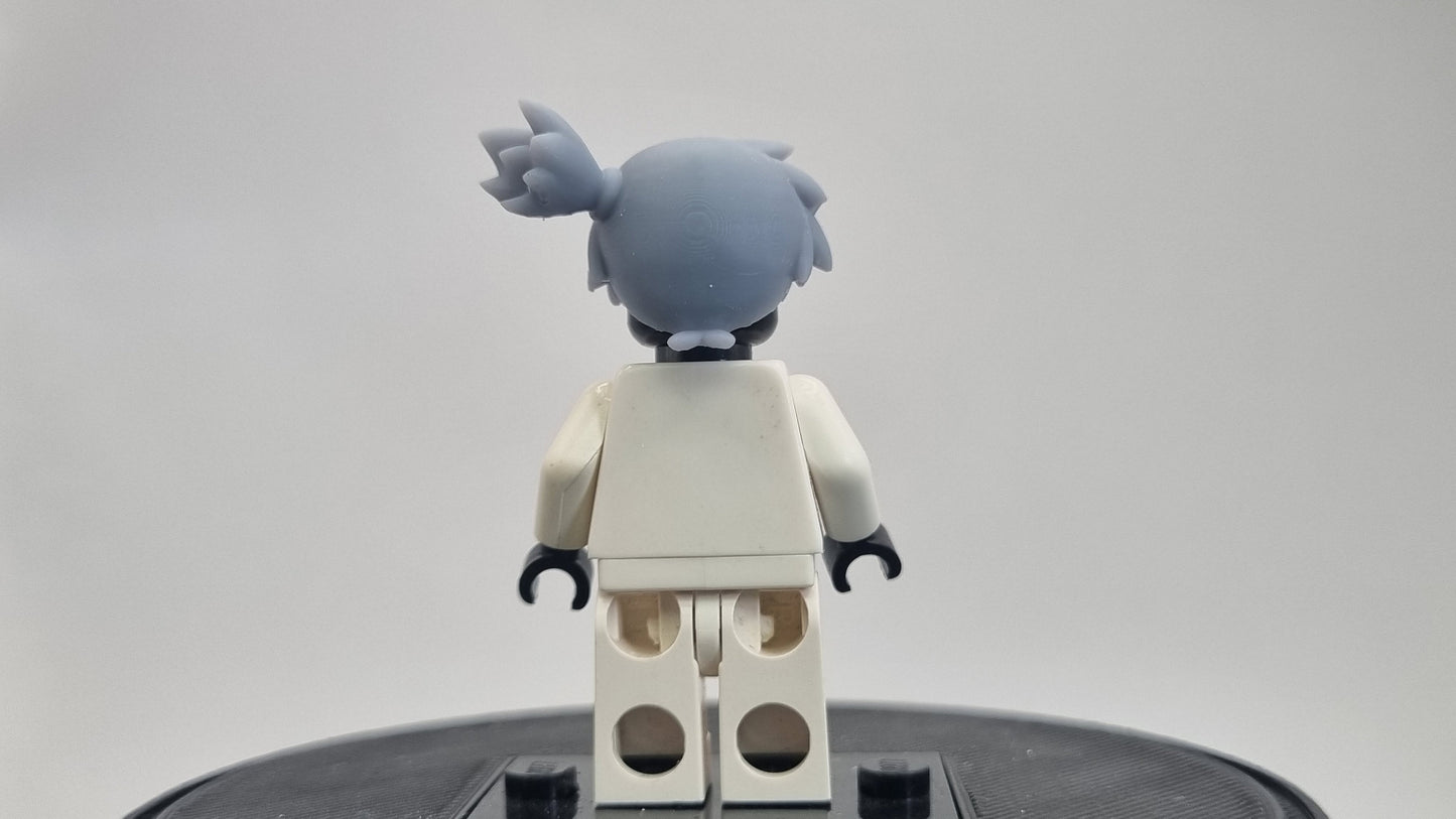 Custom 3D printed building toy animals to catch trainer with orange hair!