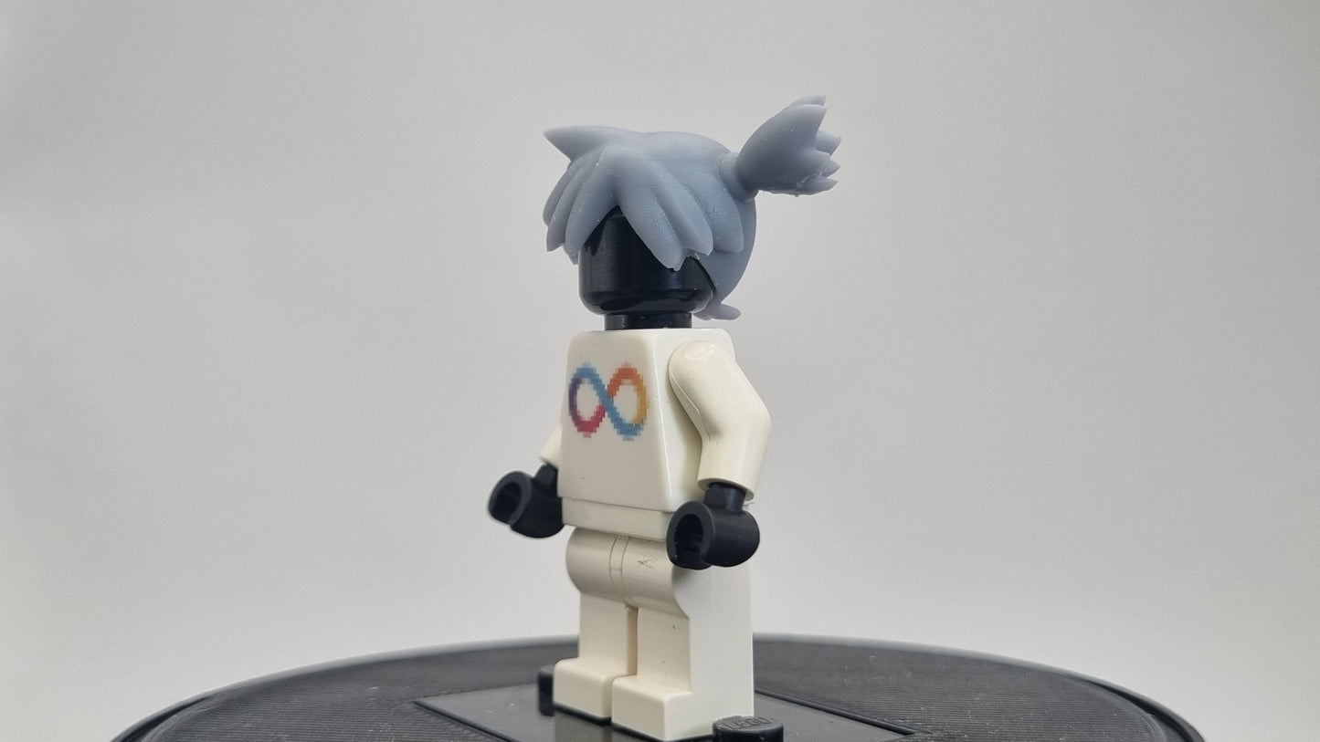 Custom 3D printed building toy animals to catch trainer with orange hair!