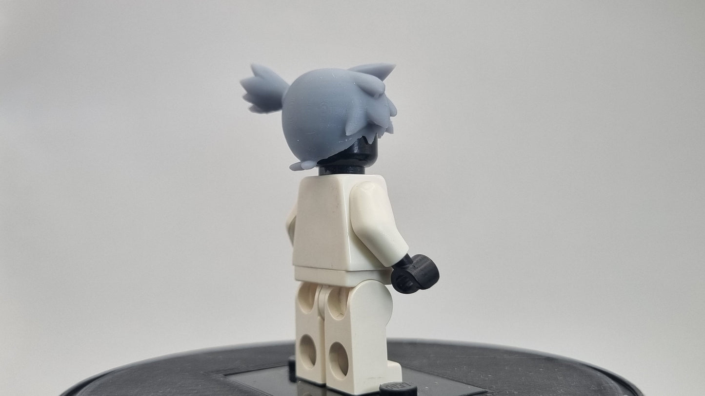 Custom 3D printed building toy animals to catch trainer with orange hair!
