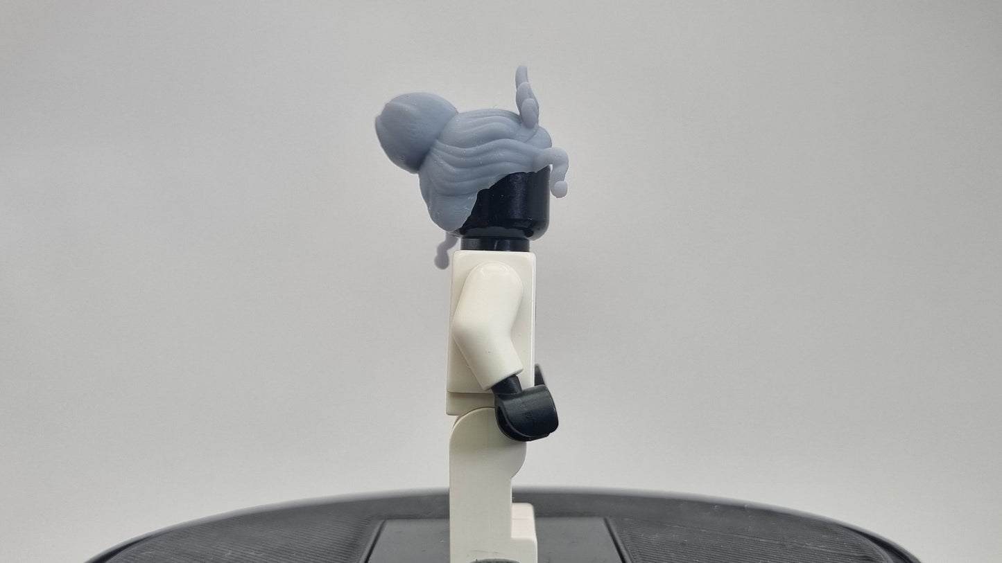 Custom 3D printed building toy princes with a love for frogs hairpiece!