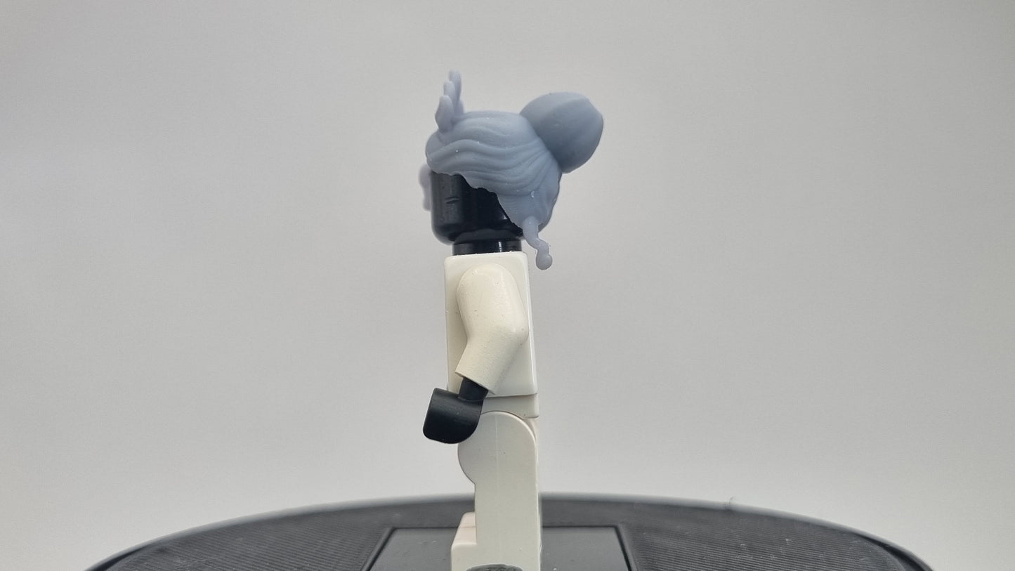 Custom 3D printed building toy princes with a love for frogs hairpiece!