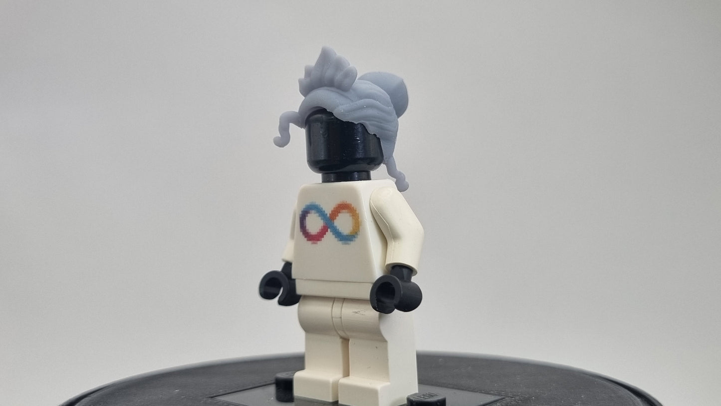 Custom 3D printed building toy princes with a love for frogs hairpiece!
