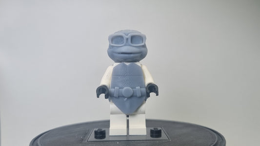 Building toy custom 3D printed purple tortoise with glasses!