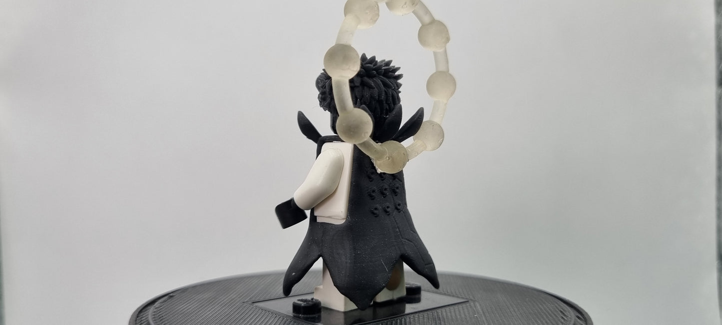 Building toy custom 3D printed ninja with rings behind him!