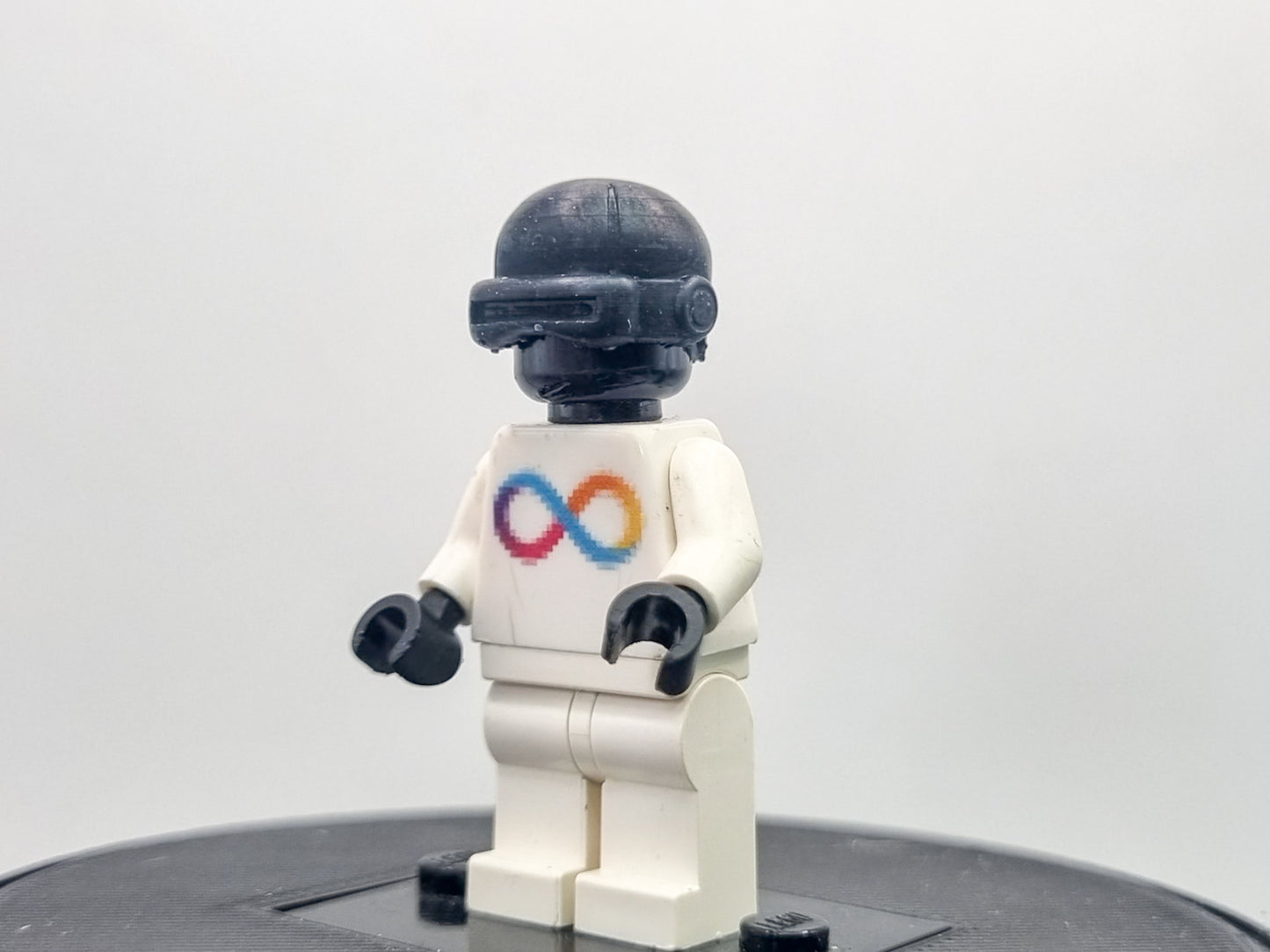 Building toy custom 3D printed bald caped hero with laser eyes
