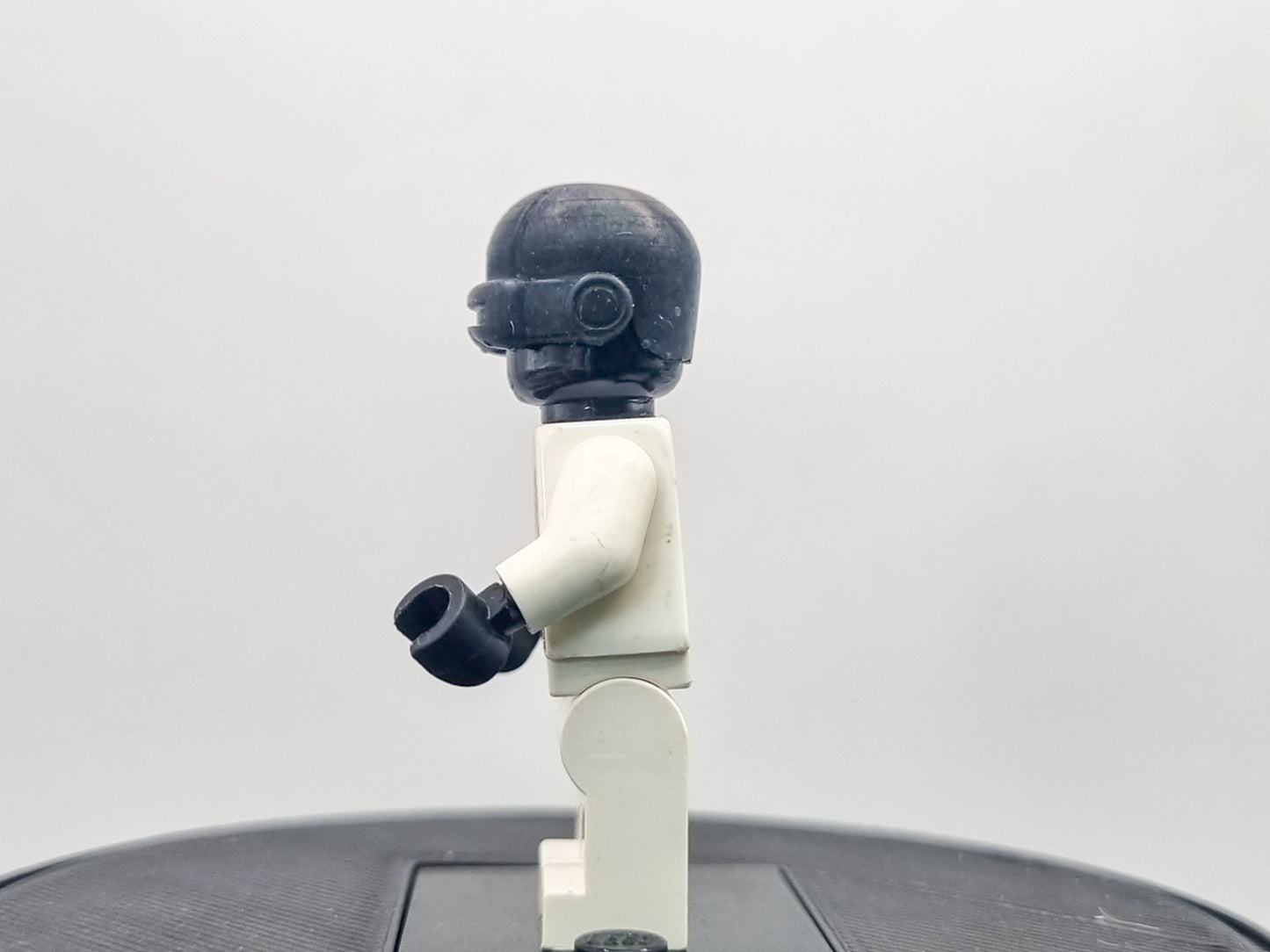 Building toy custom 3D printed bald caped hero with laser eyes