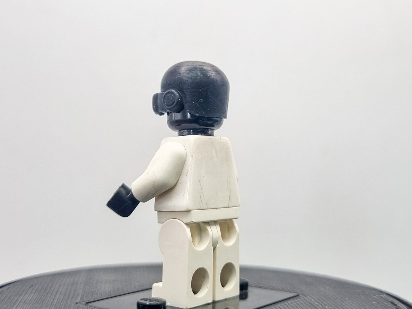 Building toy custom 3D printed bald caped hero with laser eyes