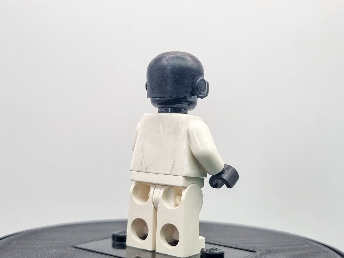 Building toy custom 3D printed bald caped hero with laser eyes