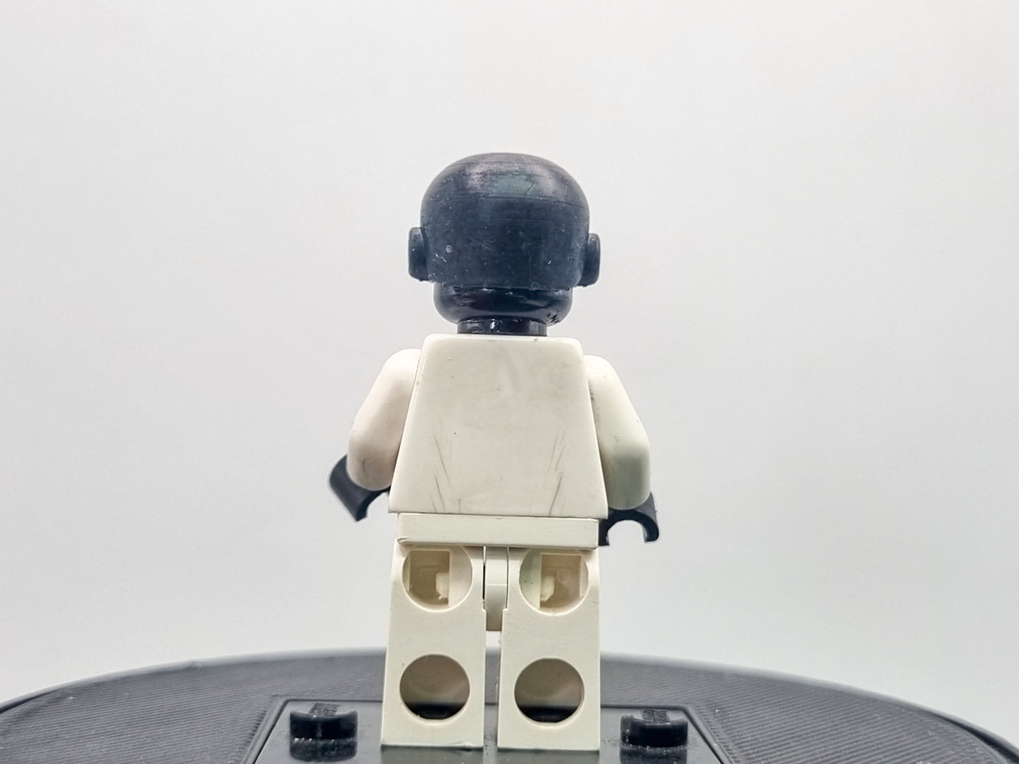 Building toy custom 3D printed bald caped hero with laser eyes