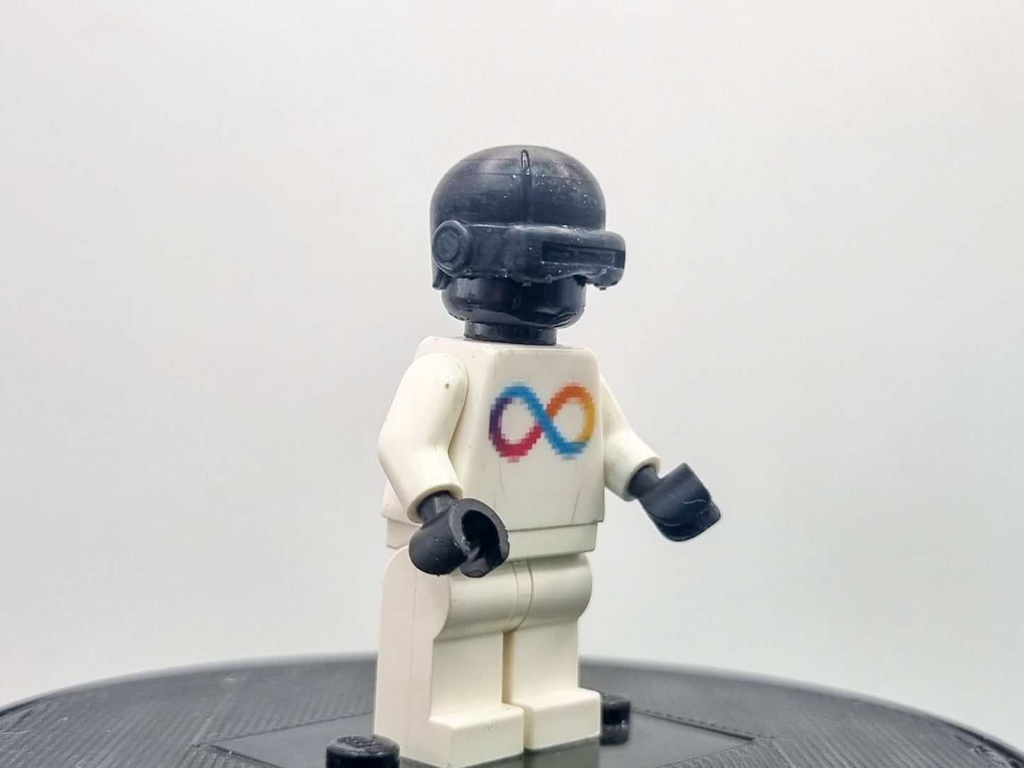 Building toy custom 3D printed bald caped hero with laser eyes