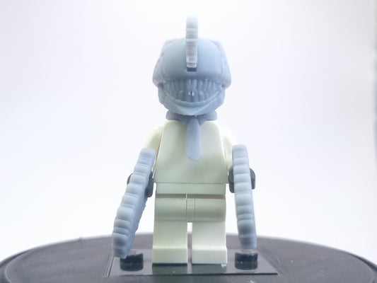 Custom lego compatible dude with chainsaws everwhere!
