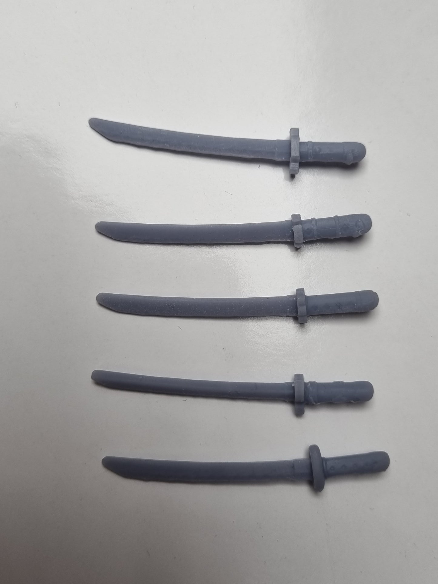 Building toy custom 3D printed 3 sword style swords!
