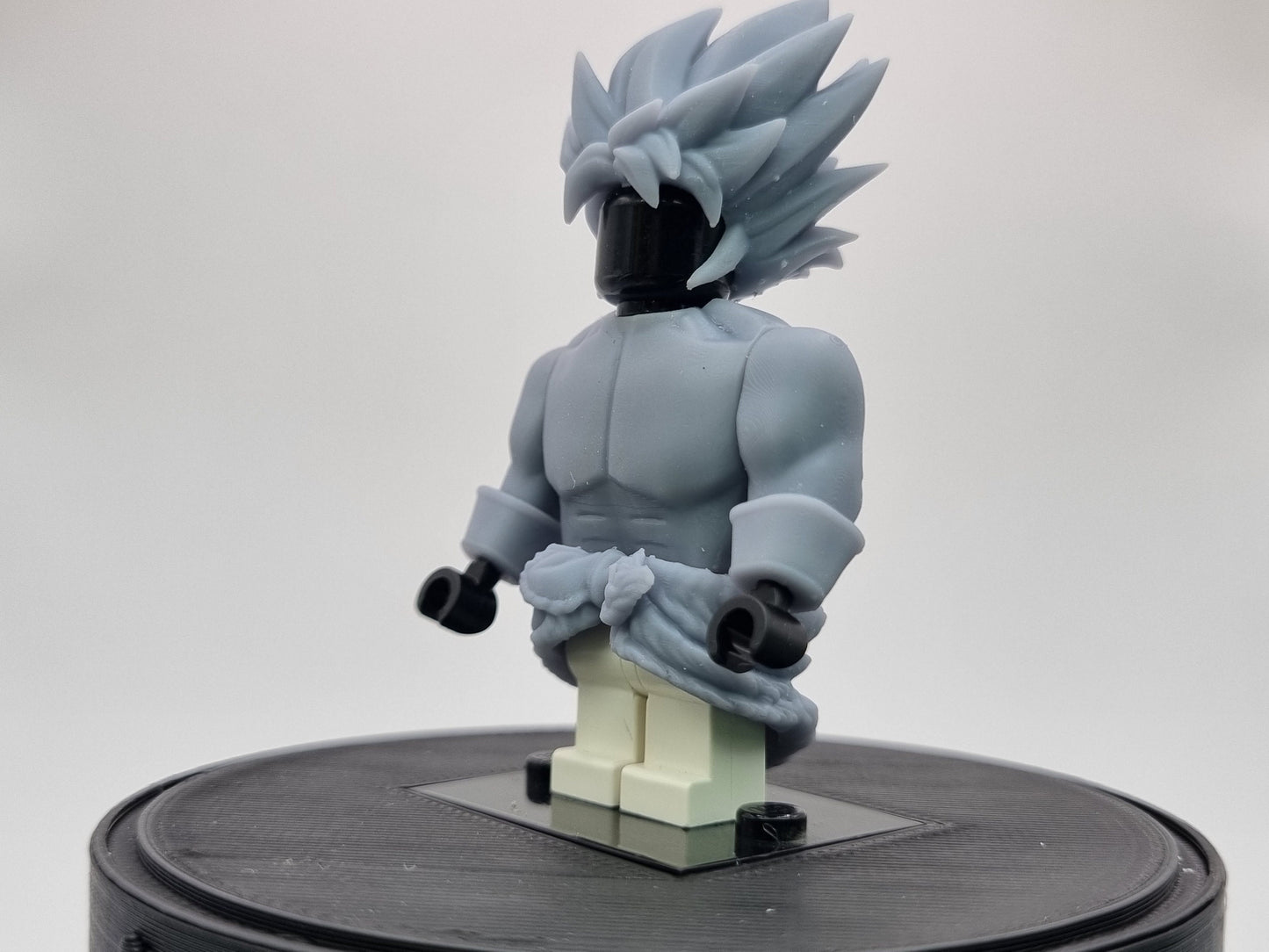 Building toy buffed guy with spikey hair!