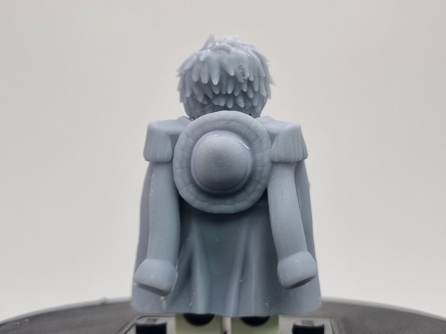 Building toy custom 3D printed rubber pirrate captain with cloak and hat off!