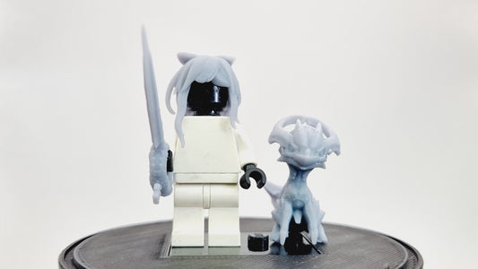 Building toy girl with little dragon and sword!